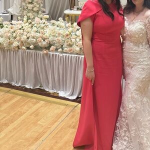 Selling elegant cape gown. Only worn once. In new- like condition.